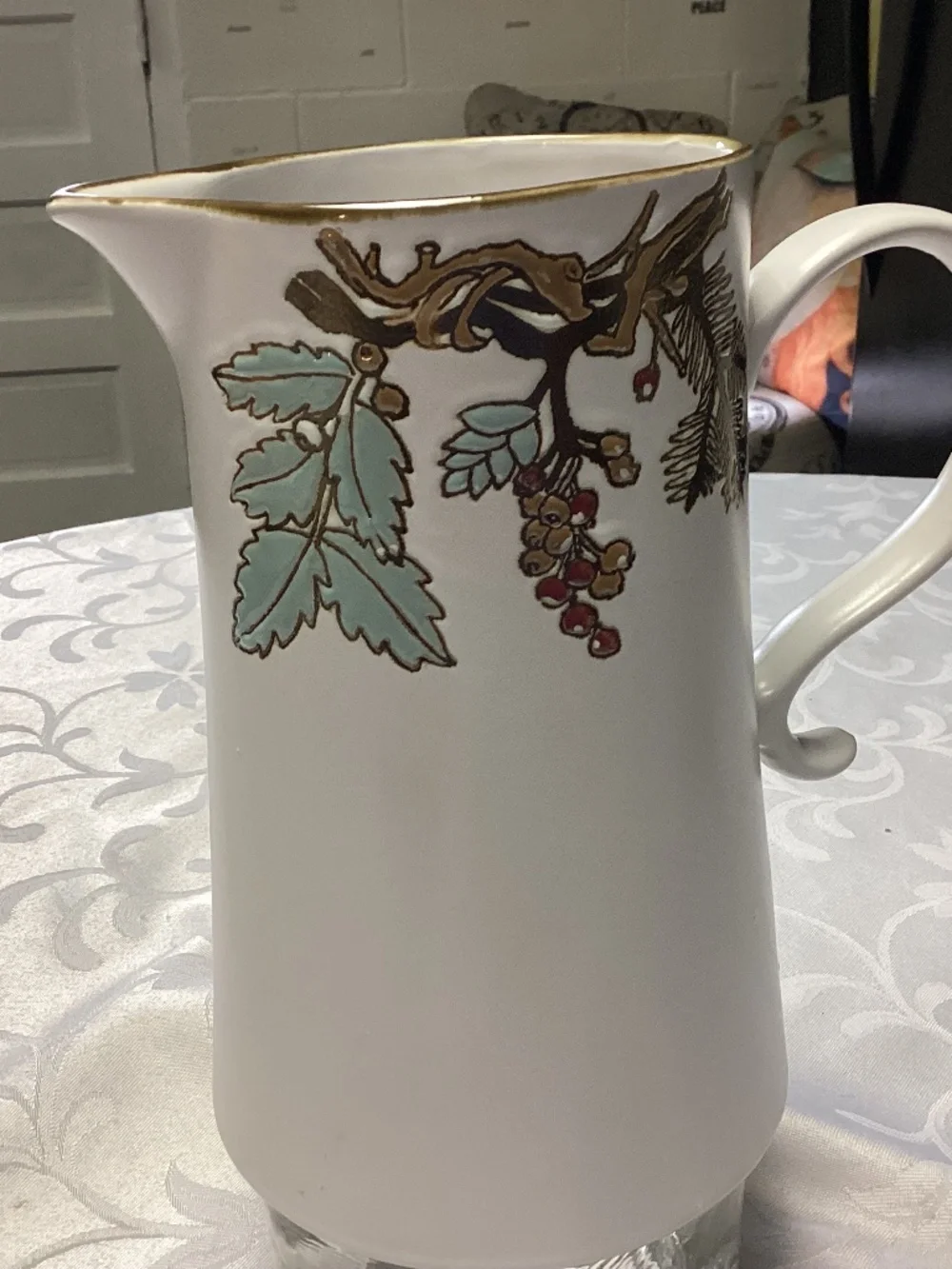 FAll themed pitcher tall cylindrical shape. Gold details too